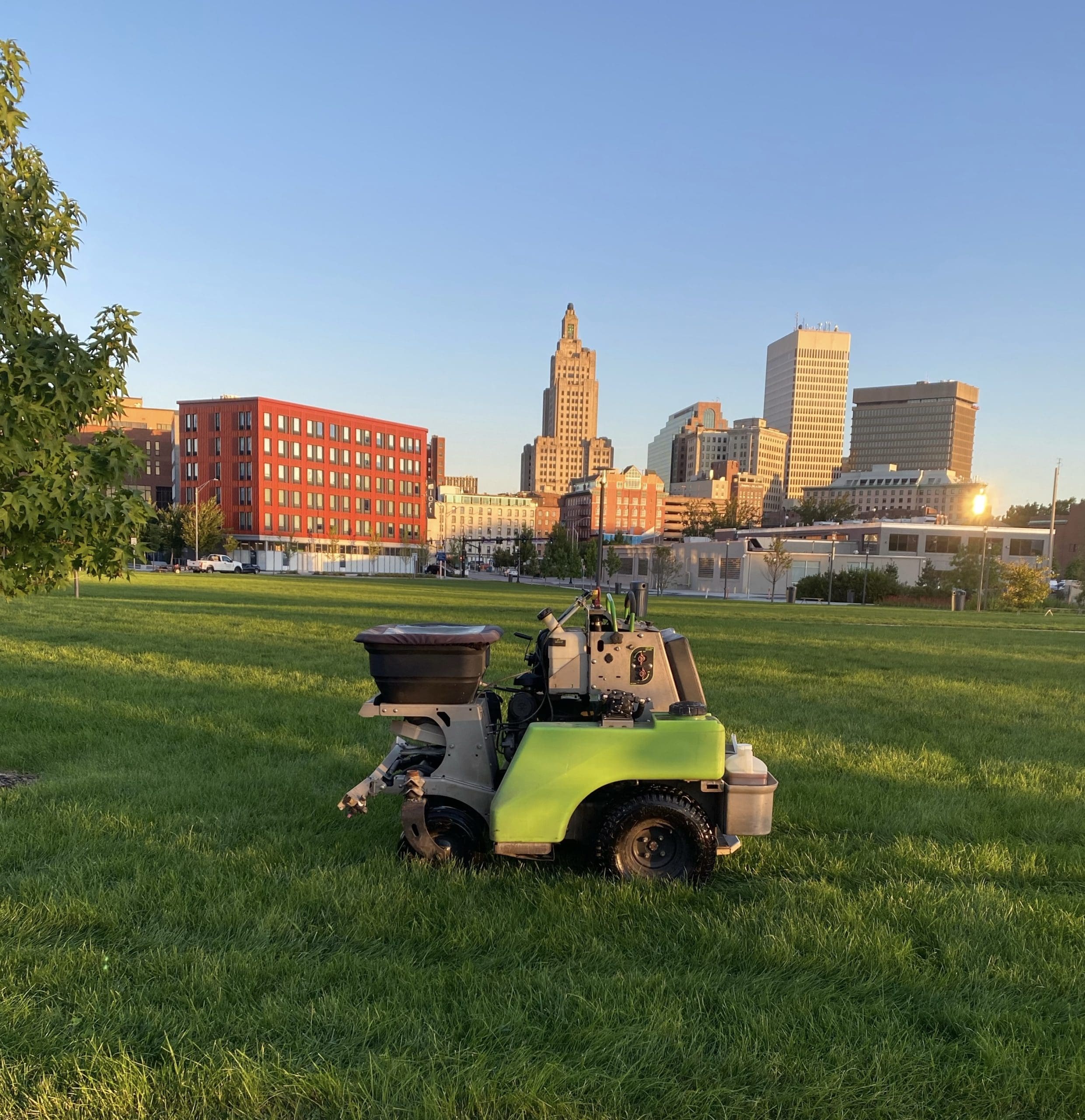 Freshly aerated and overseeded grass lawn in Massachusetts during early fall